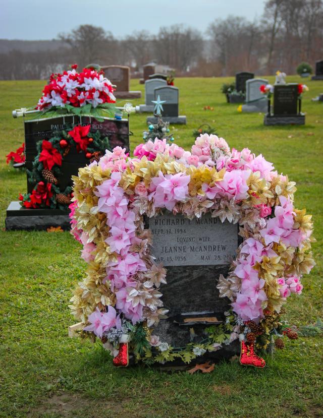 At Fall River Cemetery Decorating Loved Ones Graves For Christmas Is