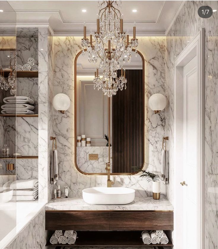 Modern Parisian Bathroom With Chandelier Marble With Gold Accents