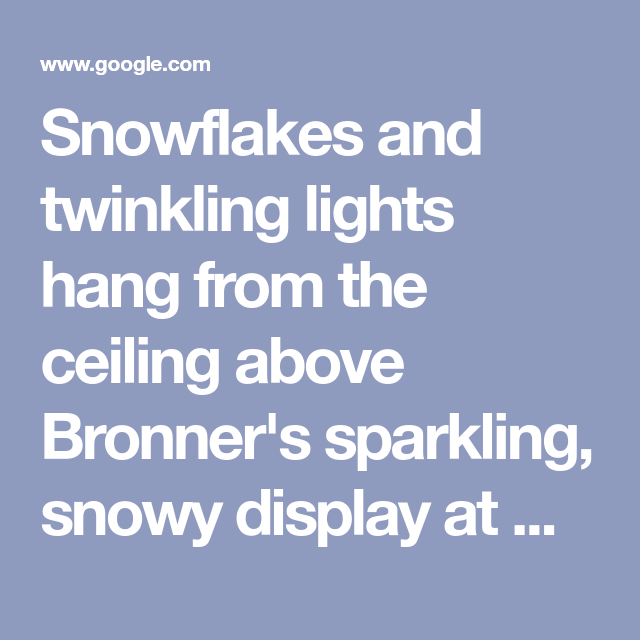 Snowflakes And Twinkling Lights Hang From The Ceiling Above Bronner S