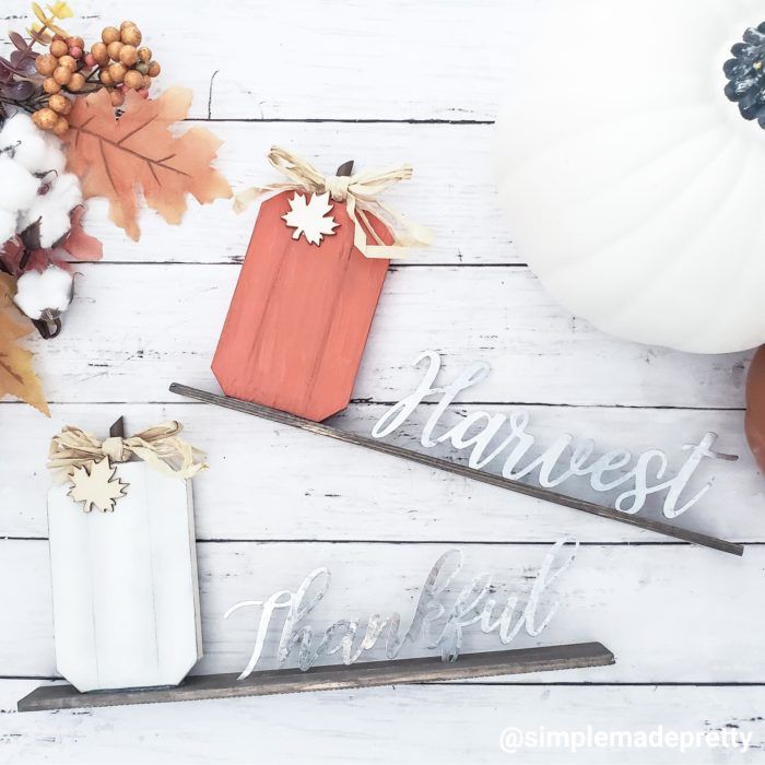 Some Pumpkins And Other Fall Decorations With The Words 50 Dollar Store