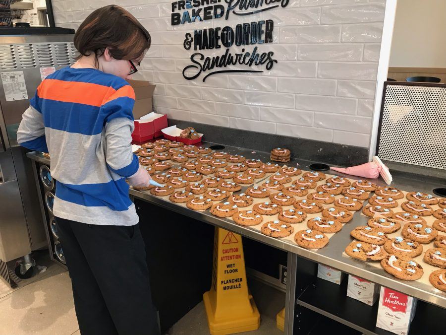 Volunteer Decorates 300 Smile Cookies