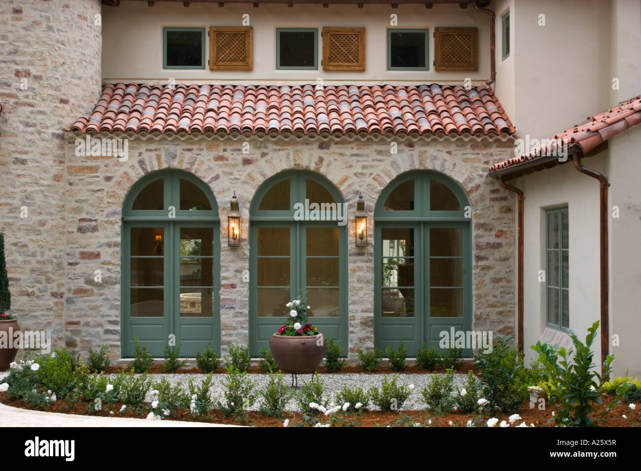 Wooden Window Shutters Full Length Windows And Spanish Style Tile Roof