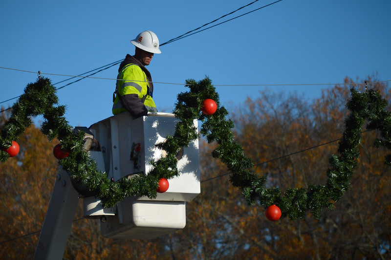 Workers From American Christmas Decorations Remove Holiday News