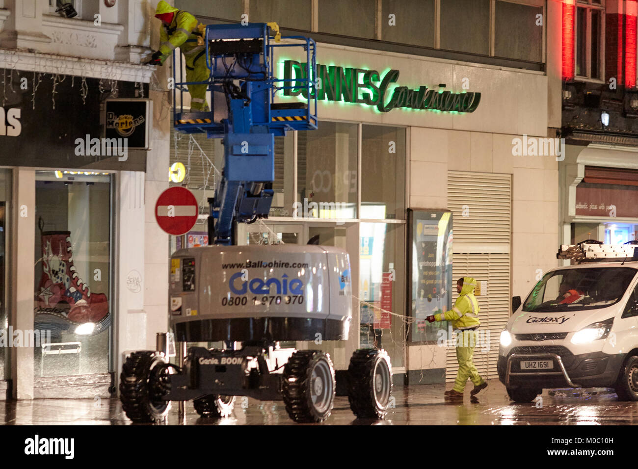 Workmen Removing Christmas Decorations In Belfast City Centre Northern